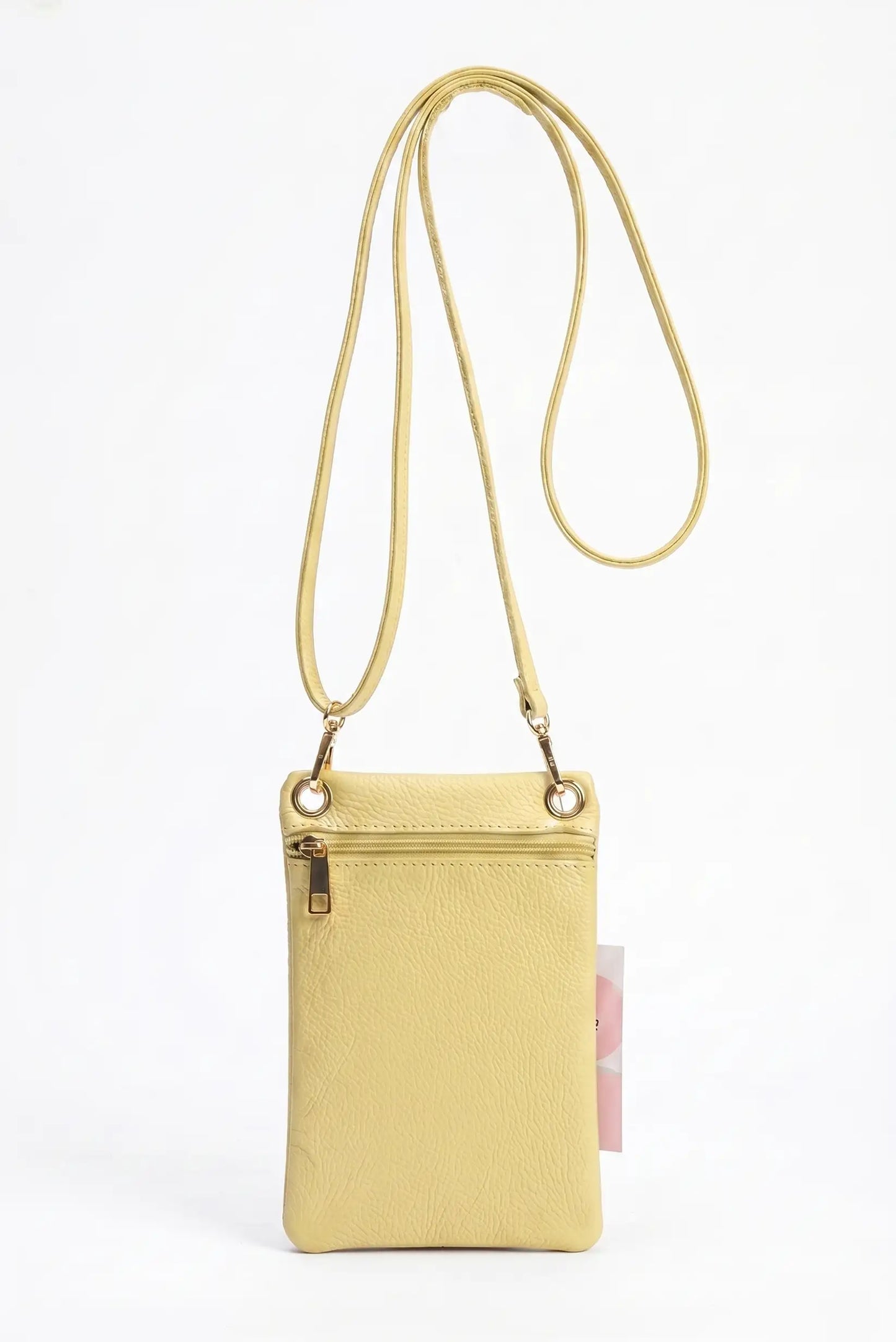Bolso bandolera portamóvil de piel color amarillo con cremallera y correa ajustable.