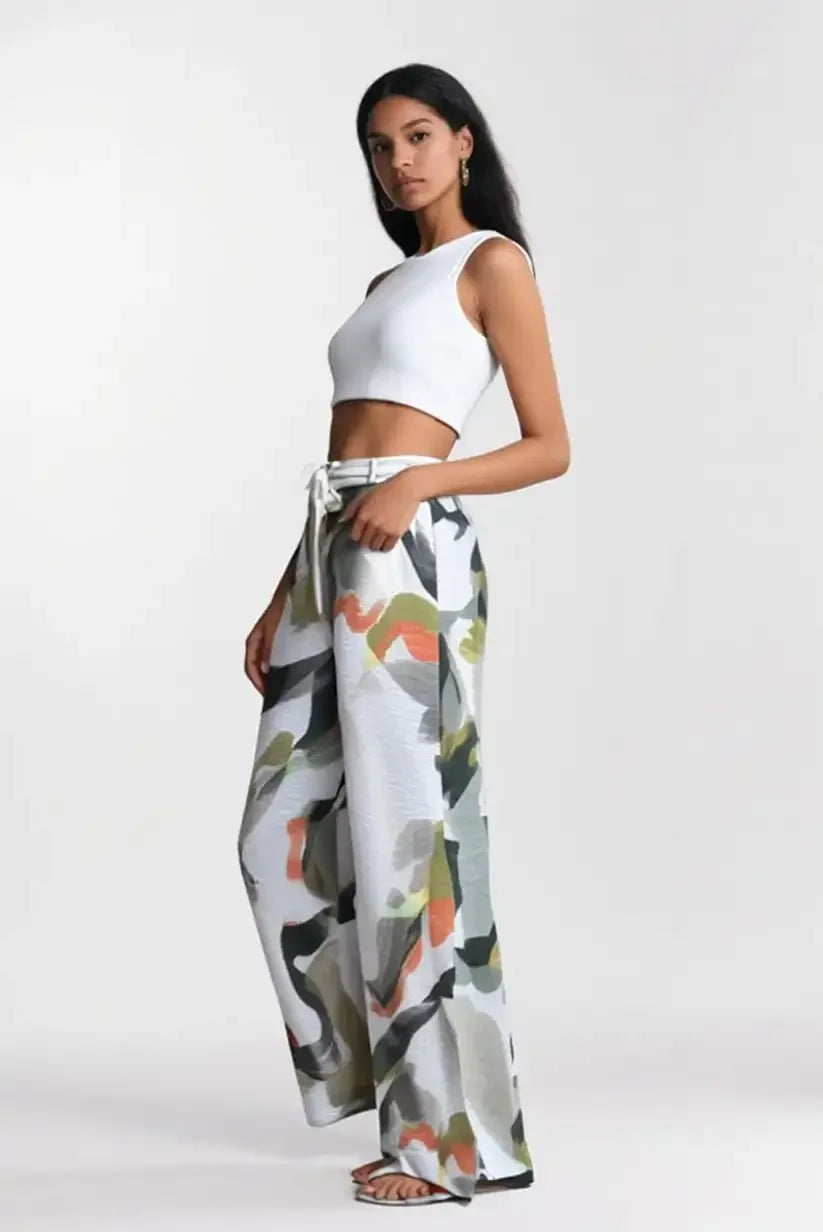 Pantalón mujer largo beige con estampados florales verdes - CHICA del Sur