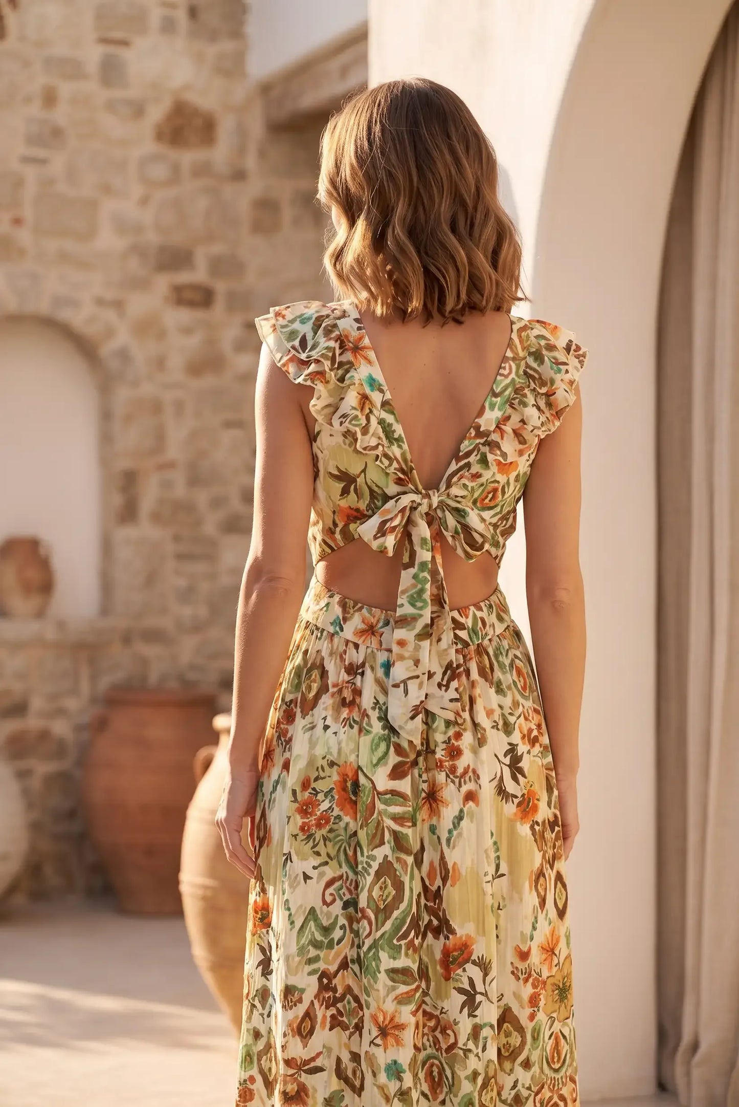 Vestido largo floral con espalda descubierta y lazo, ideal para verano y ocasiones especiales