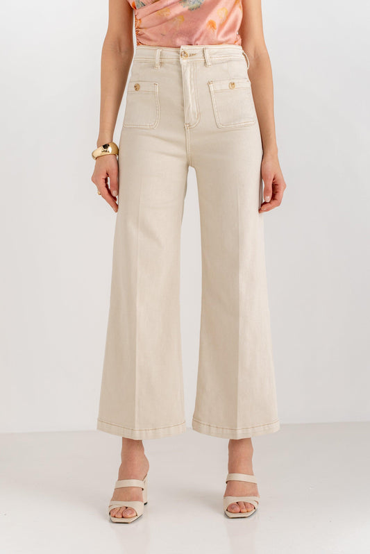 Pantalón beige campana tobillero mujer moda 2025, bolsillos frontales grandes