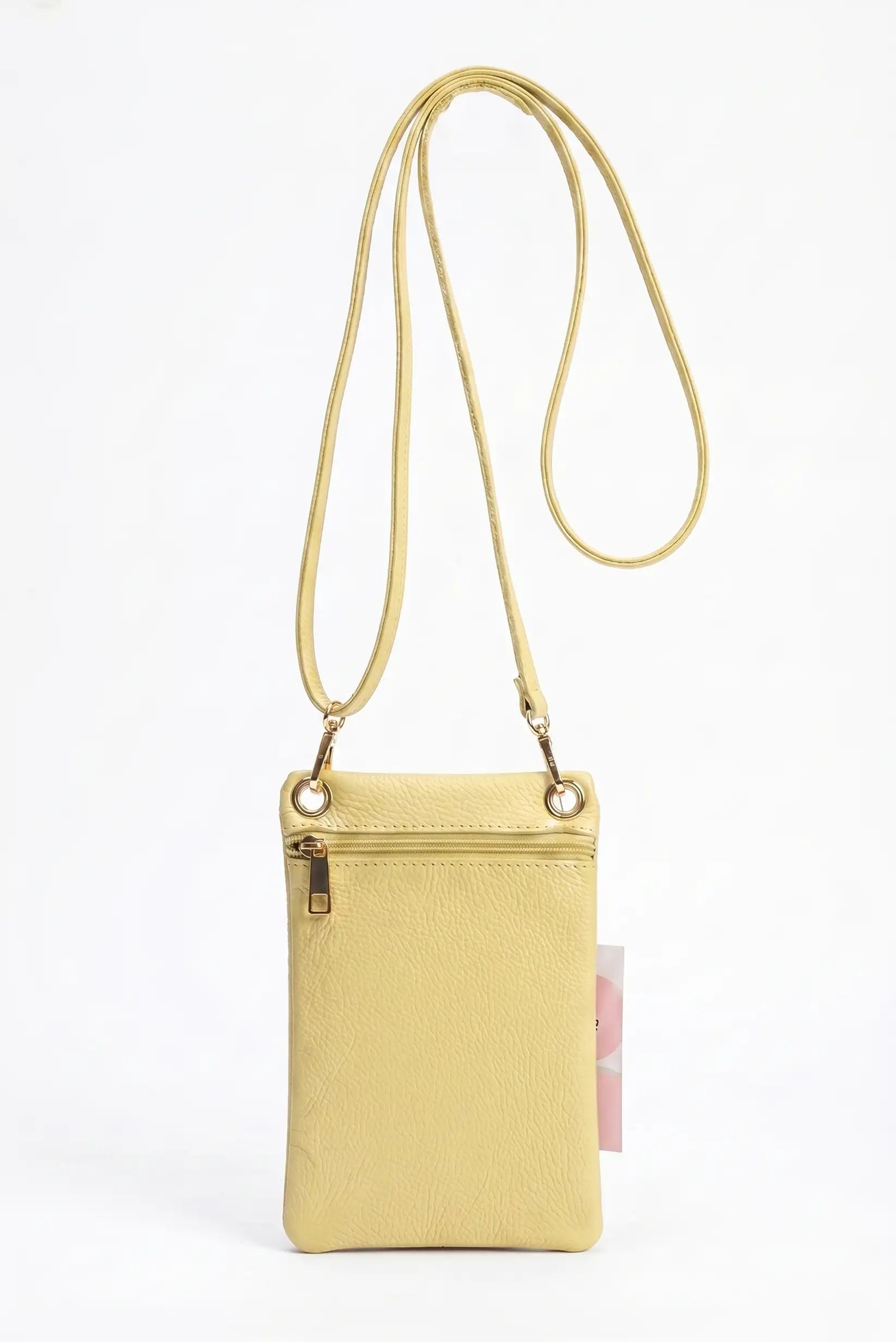 Bolso bandolera portamóvil de piel color amarillo con cremallera y correa ajustable.