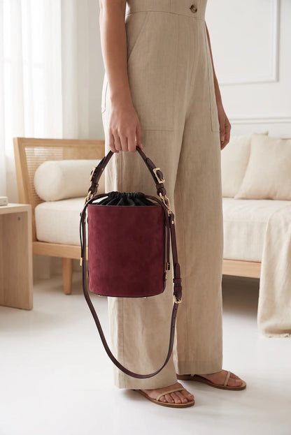 Bolso bombonera de mano y hombro mediano ante