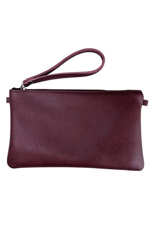 Bolso clutch de piel burdeos de CHICA del Sur con asa corta y cierre de cremallera.