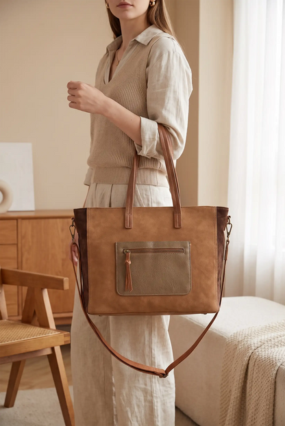 Bolso tote de piel marrón con correa ajustable y bolsillo frontal