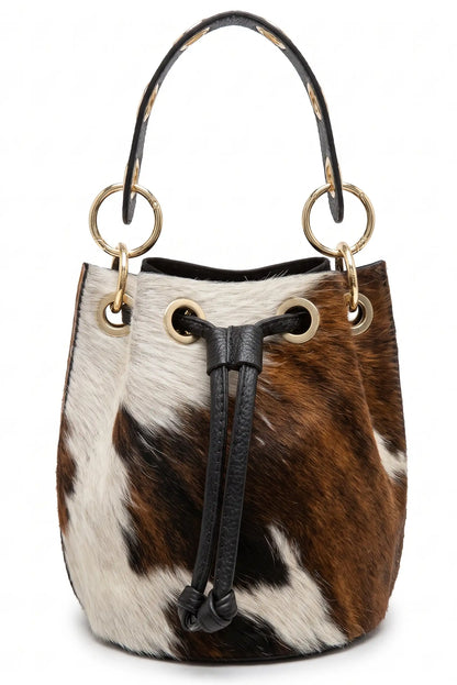 Bolso saco de mujer CHICA del Sur estampado de vaca con pelo de potro y detalles negros