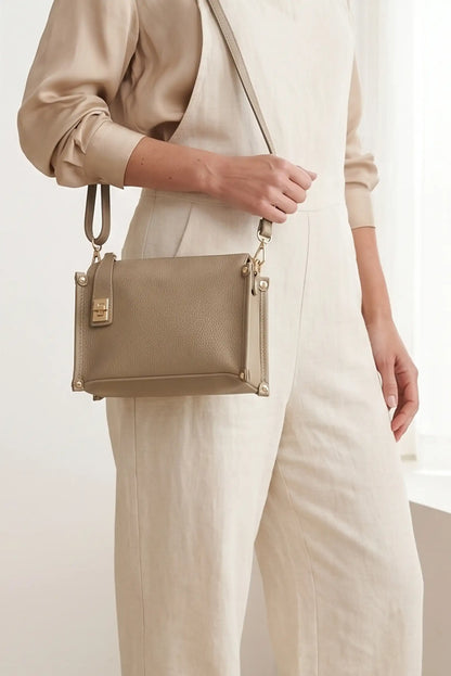 Bolso de mano y bandolera pequeño en piel