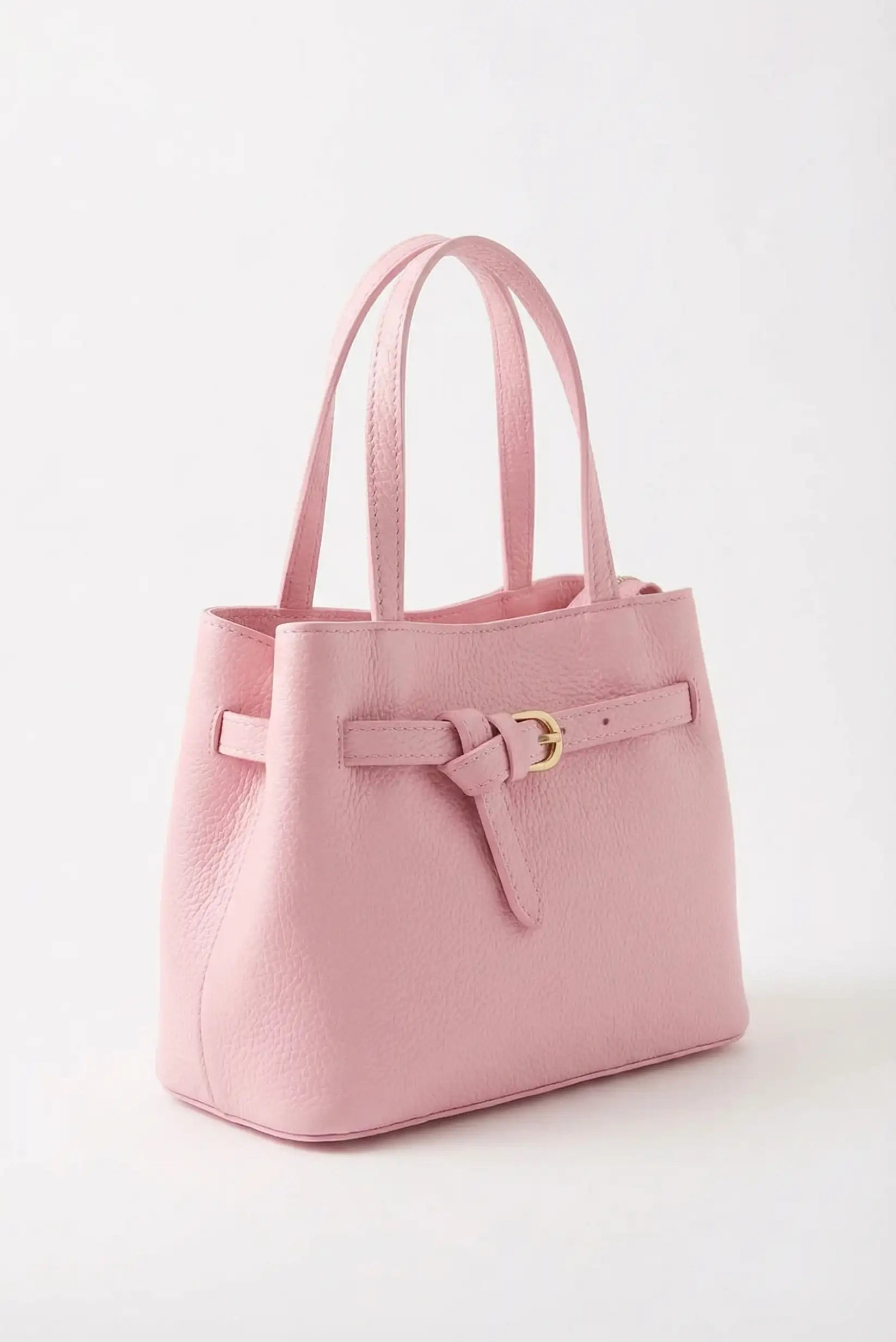 Bolso mediano rosa pastel de mano y bandolera con detalle de hebilla dorada