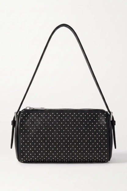 Bolso pequeño de mujer negro de CHICA del Sur con tachuelas metálicas y asa larga.