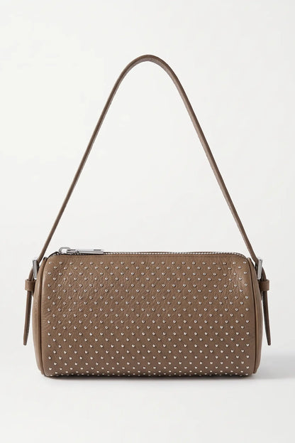 Bolso pequeño de mujer taupe de CHICA del Sur con tachuelas metálicas y asa larga.