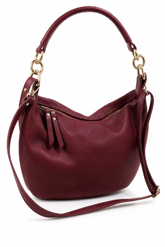 Bolso de hombro de piel en color burdeos con asa corta y correa larga ajustable