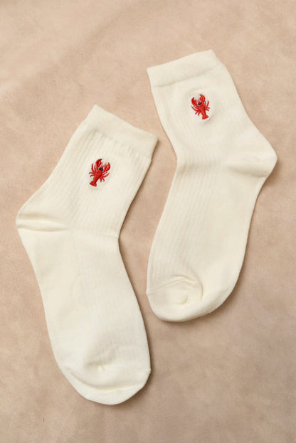 Calcetines blancos de mujer con bordado de langosta roja, moda casual de primavera.