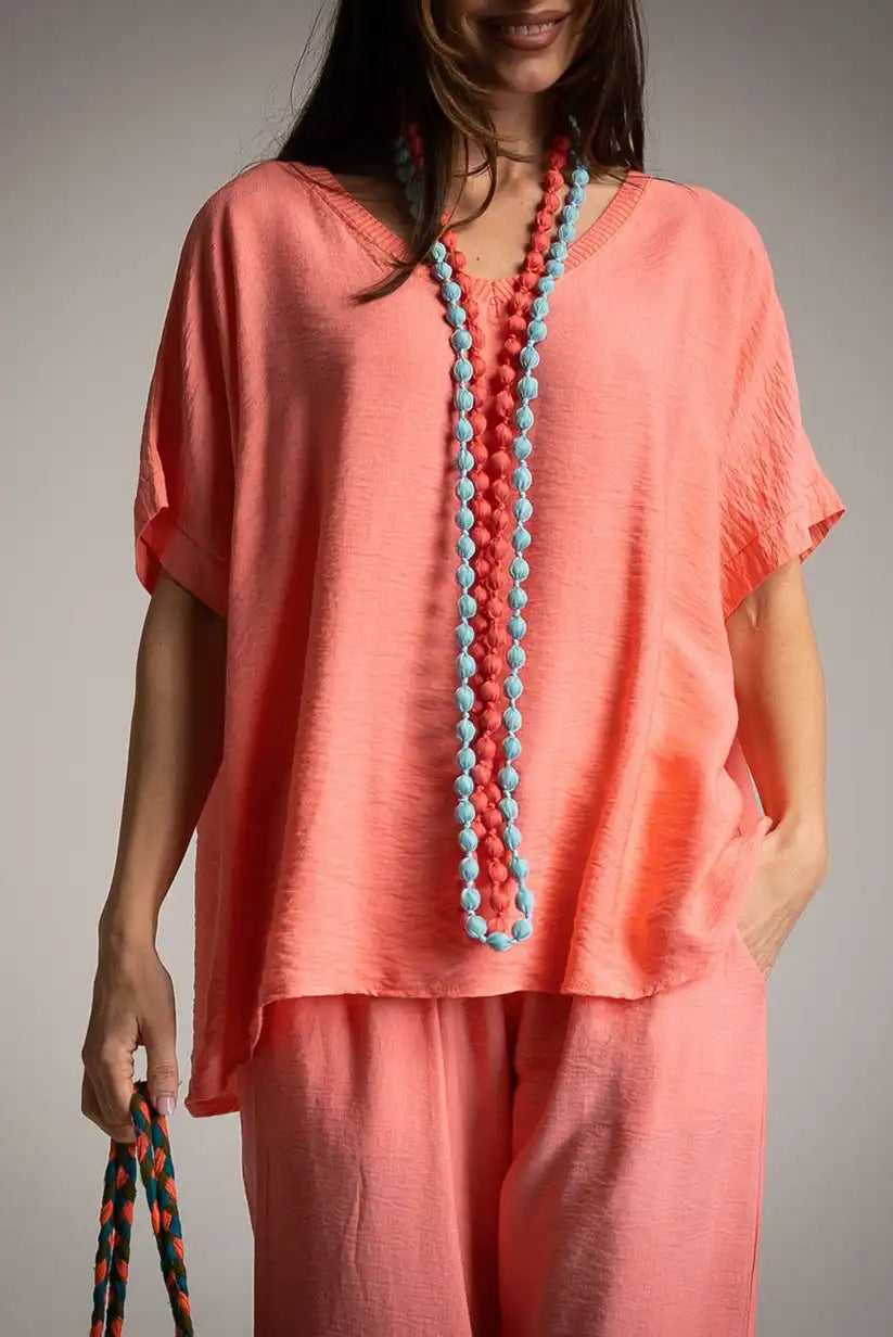 Camiseta oversize coral con puntilla en la espalda - CHICA del Sur