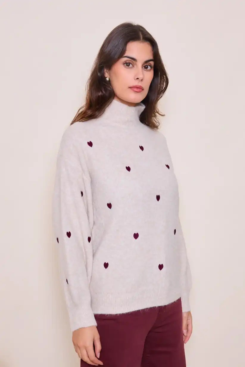 Jersey mujer cuello alto beige con corazones bordados burdeos - CHICA del Sur