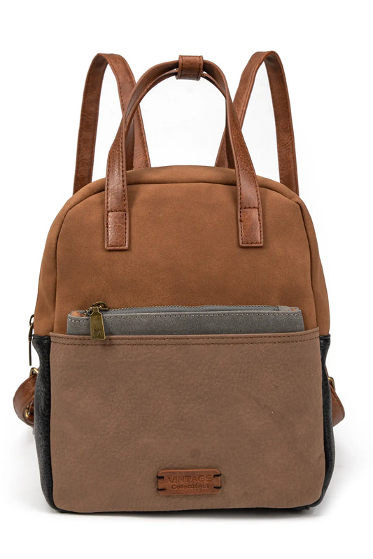 Mochila marrón vintage con asas y bolsillo frontal, ideal para mujer