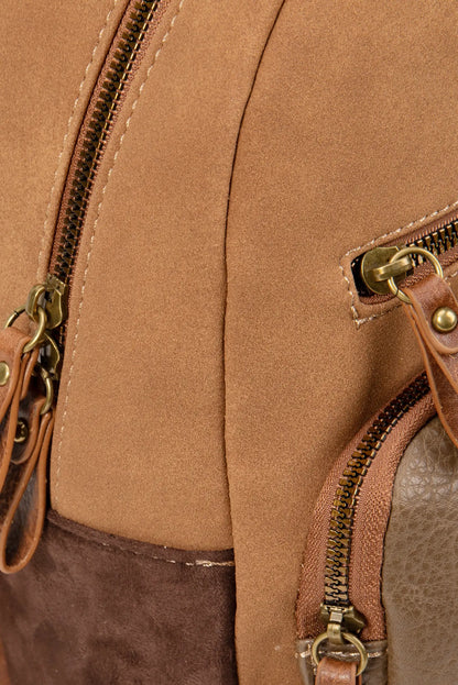 Bolso marrón con cremalleras doradas y detalles en cuero, ideal para moda femenina