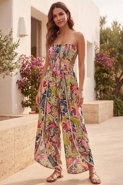 Vestido floral sin tirantes con estampado vibrante y detalles de pompones, ideal para verano