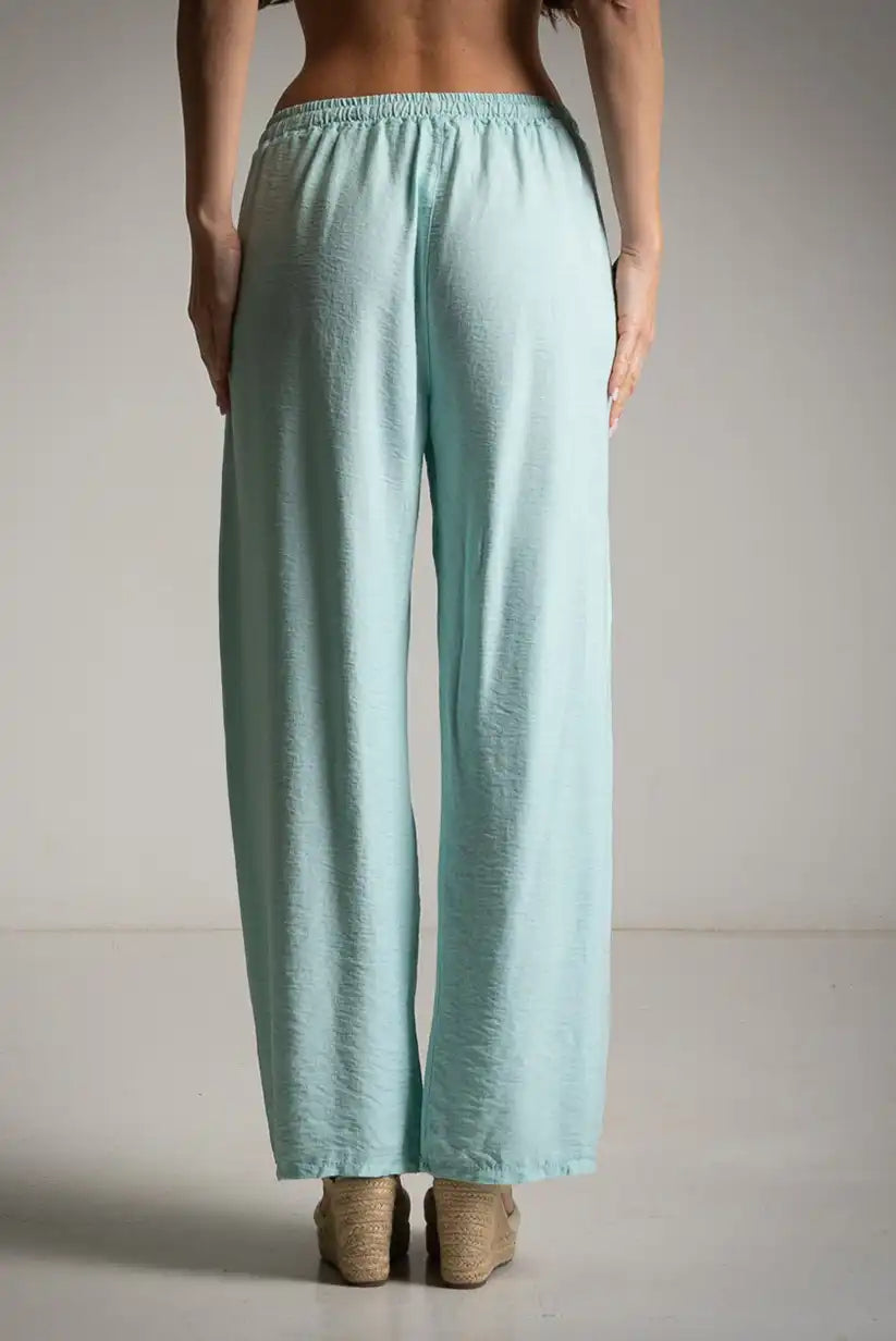 Pantalón fluido turquesa con bolsillos y cintura con cordón - CHICA del Sur