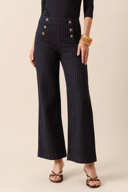 Pantalones anchos de rayas verticales con botones frontales, estilo elegante y moderno para mujer