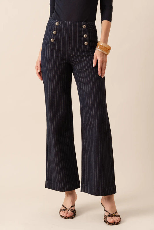 Pantalones anchos de rayas verticales con botones frontales, estilo elegante y moderno para mujer
