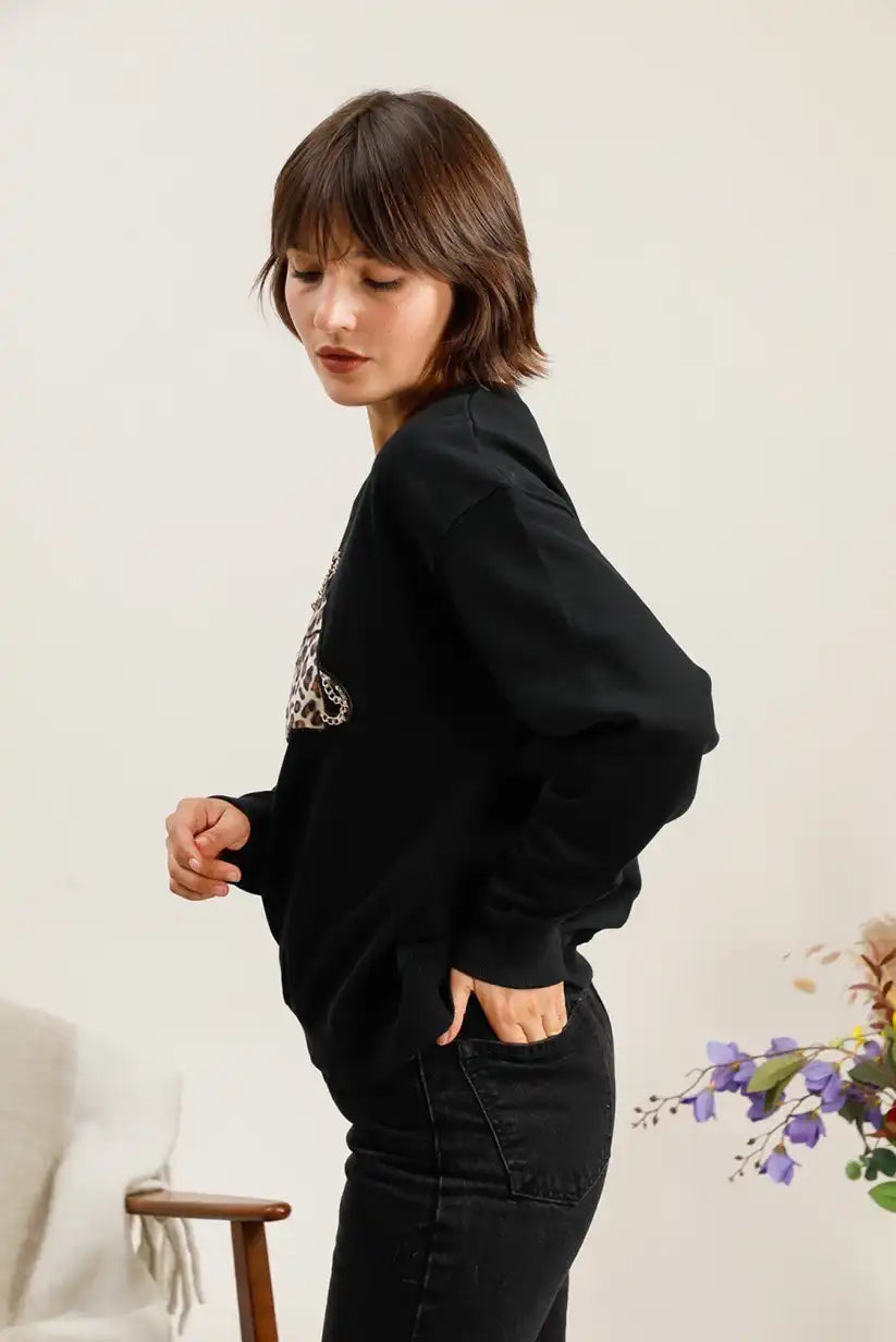 Sudadera mujer Negra animal print “Wild Bag” - CHICA del Sur