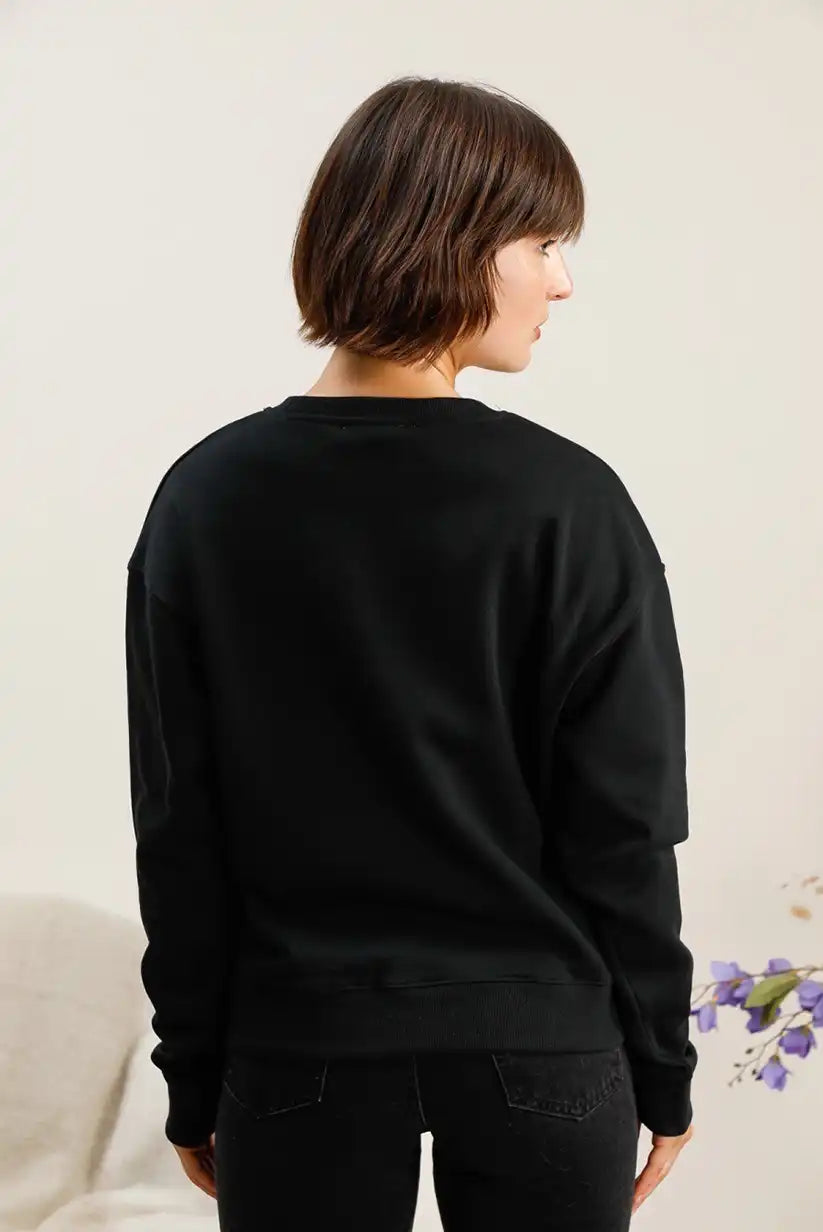 Sudadera mujer Negra animal print “Wild Bag” - CHICA del Sur