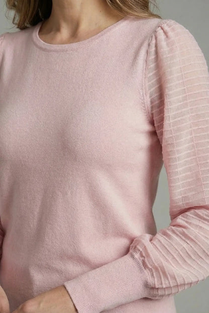 Top de mujer rosa pastel de manga larga con textura acanalada, estilo primavera casual