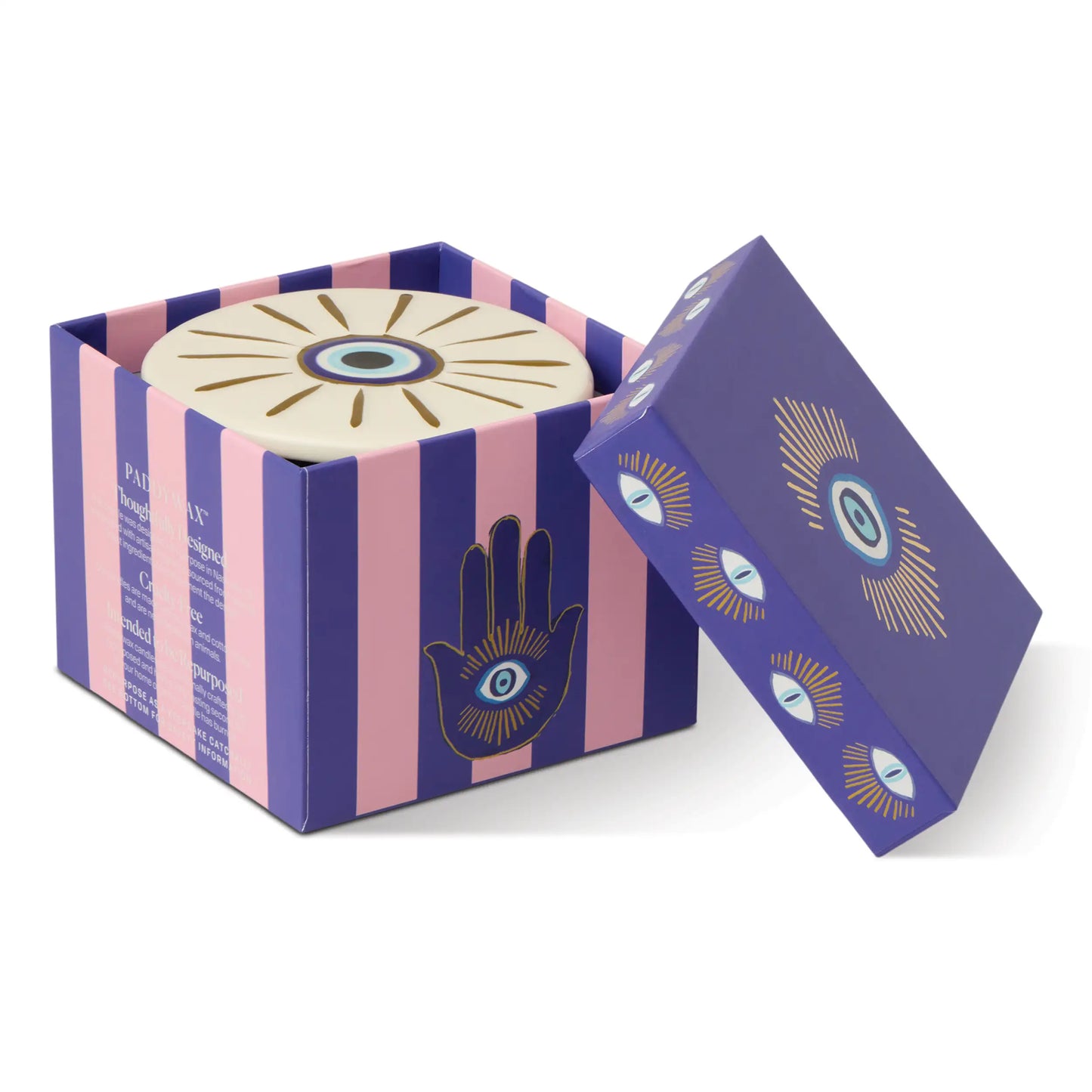 Vela decorativa Paddywax Evil Eye en caja morada y rosa, con diseño de ojo místico.