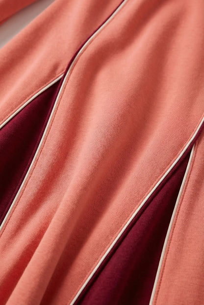 Detalle de tela de vestido largo mujer salmón con pliegues burdeos, moda CHICA del Sur