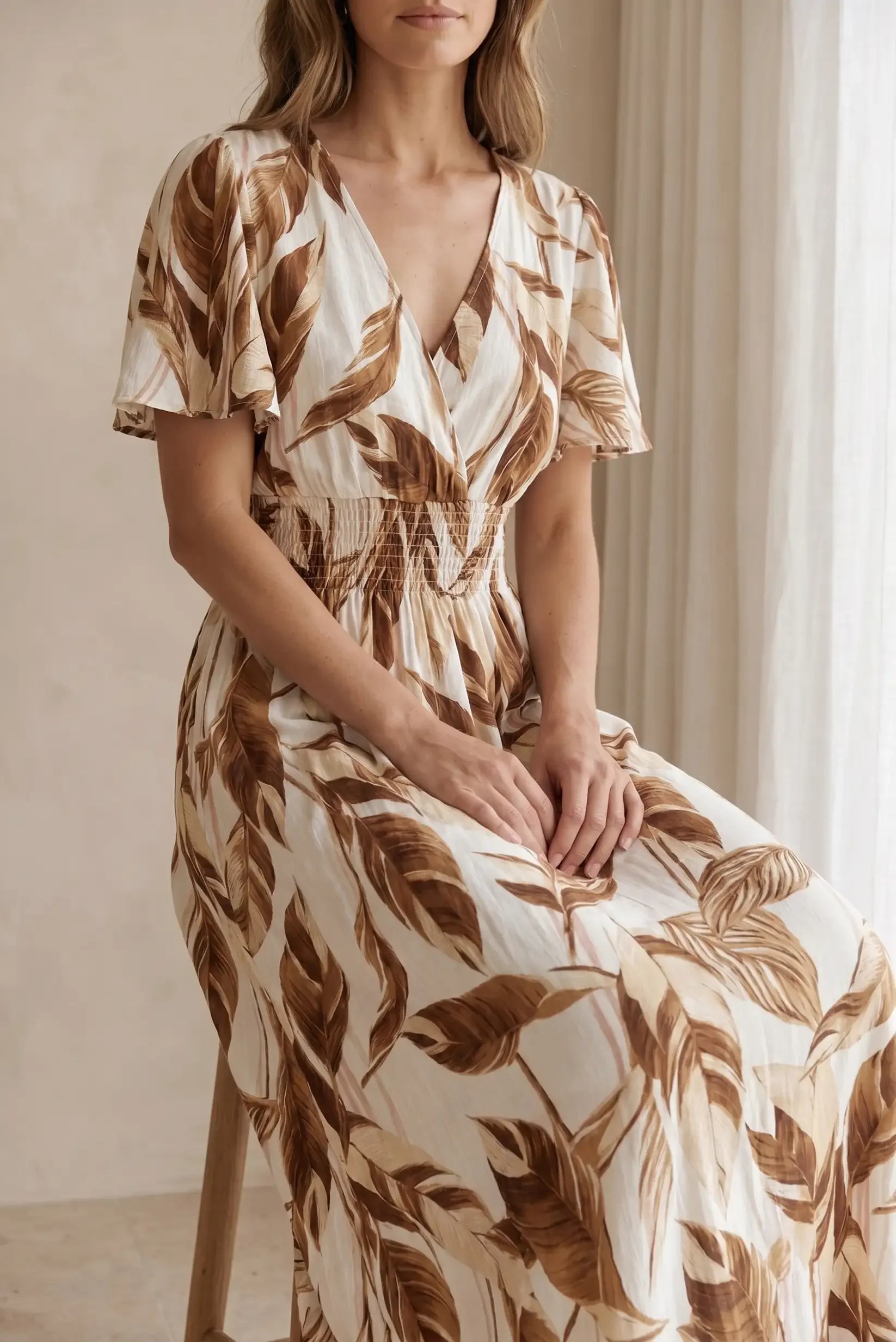 earth tone maxi dress Flowy earth-tone leaf print 💃 – CHICA del Sur Color:Cloud Dancer EID 2026 Lace wedding dresses - pleated details​ and a